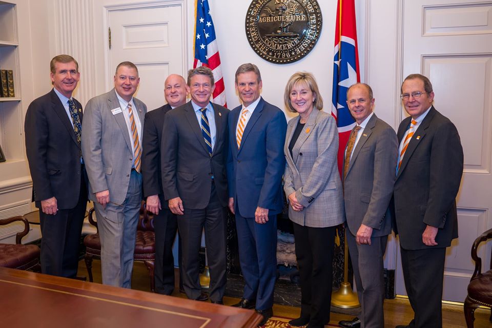 Governor Bill Lee standing with UT President Randy Boyd and all of the UT chancellors.